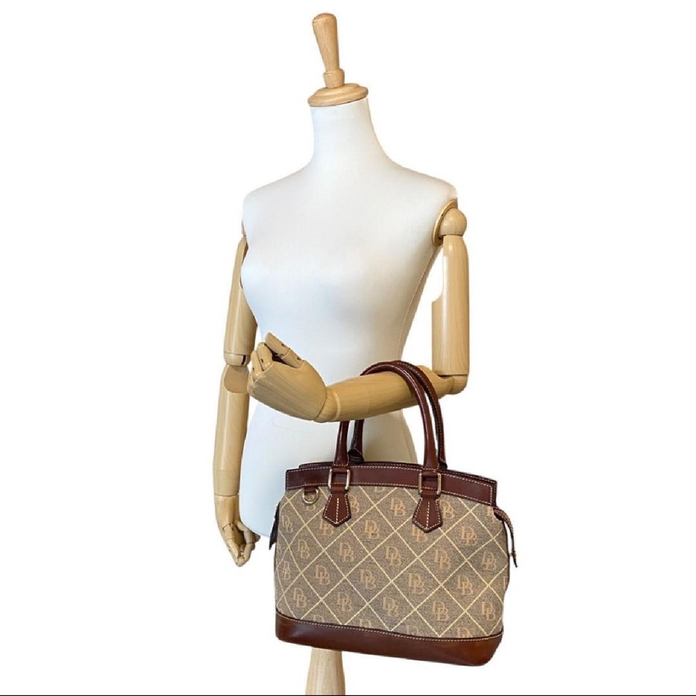 Dooney & Bourke Medium Domed Zip Top Satchel with crossbody strap - Picture 8 of 10